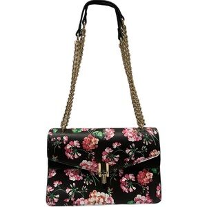 NWOT Lionel black floral handbag w/ gold chain in vegan leather. 8” x 11” purse.